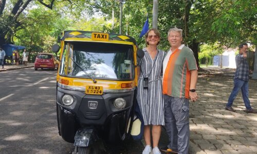 Exploring vibrant street in Fort Kochi, Kerala on Auto Rikshaw colorful street art, and a lively atmosphere, capturing the unique blend of history and culture in this historic coastal town.